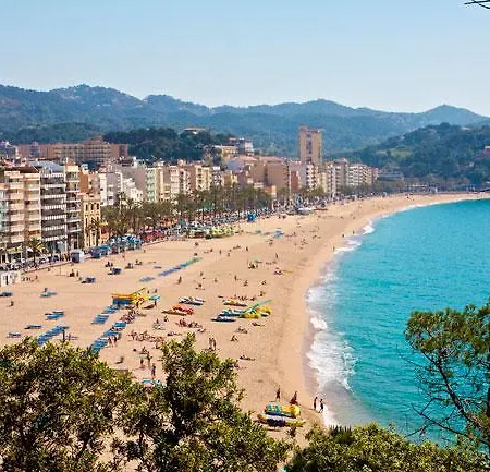 Апартаменти Homeholidaysrentals Rieral